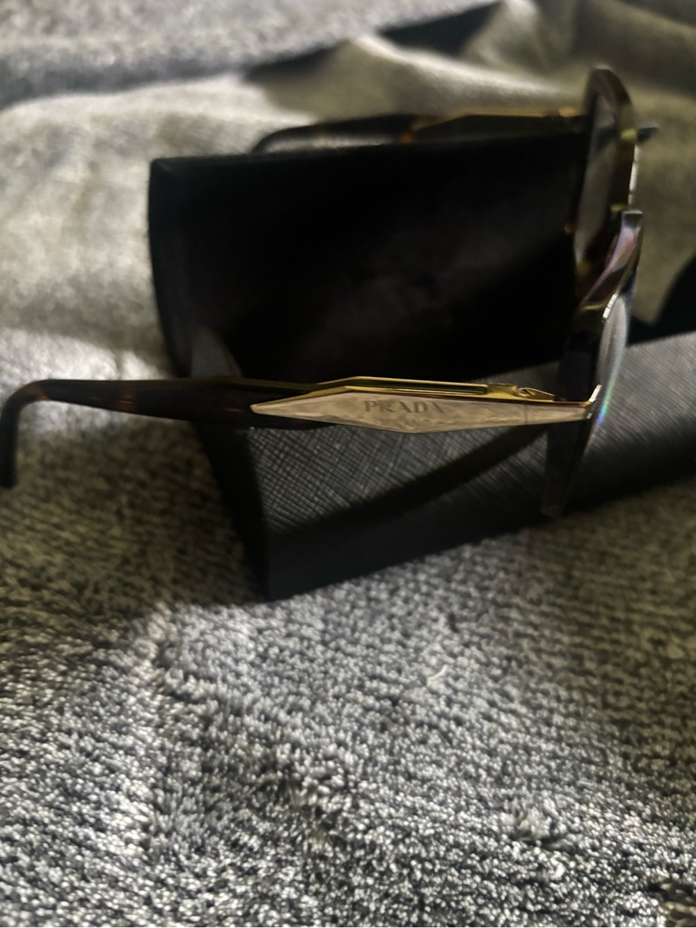 Prada Brown Tortoiseshell glasses with Gold Temple Plaque